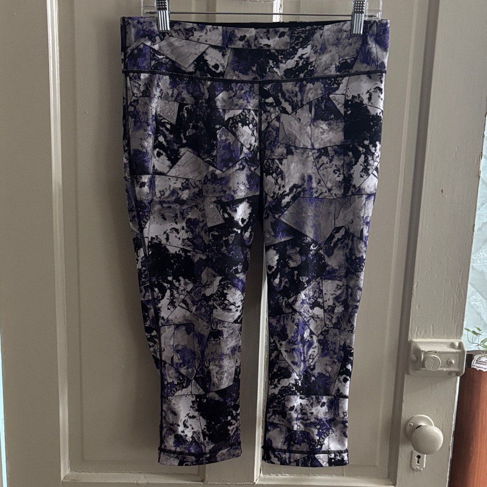Ideology Abstract Black and Purple cropped leggings.